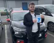 This is Anas looking pleased with his achievement of a driving test pass, as well he should.